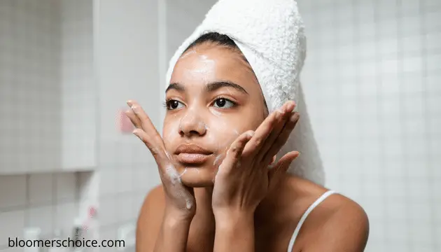 girl washing face using soap