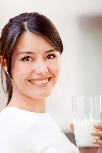 woman drinking rice milk